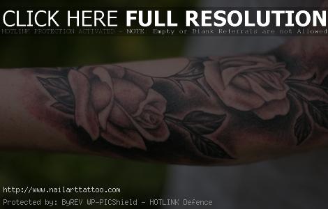 black and white rose tattoo arm