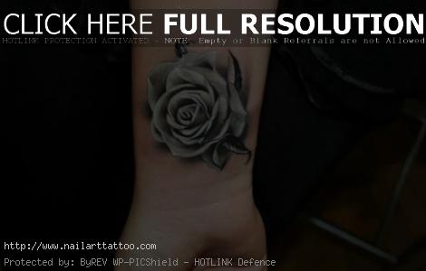 black and white rose tattoo on wrist