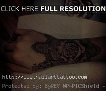 black and white rose tattoos on wrist