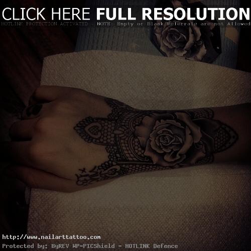 Black And White Rose Hand Tattoo