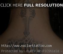 black cross tattoo on neck