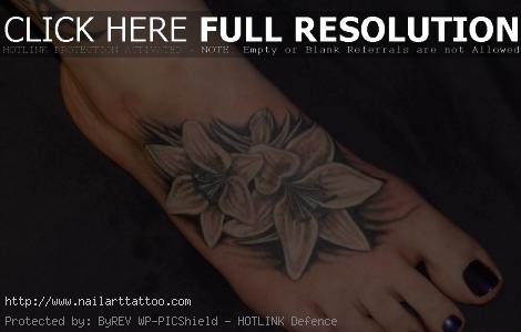 black flower tattoo on foot