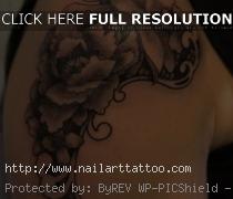 black flower tattoo shoulder