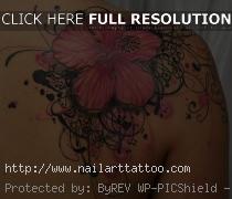 black flower tattoos on shoulder