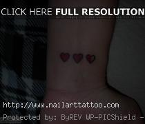 black heart tattoo on wrist