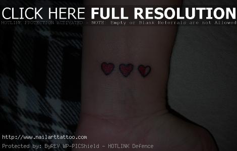 black heart tattoo on wrist