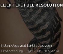black koi tattoo arm