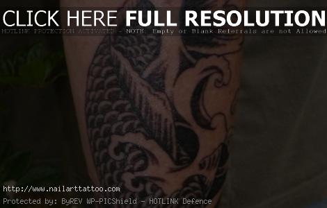 black koi tattoo forearm