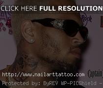 chris brown black eye tattoo