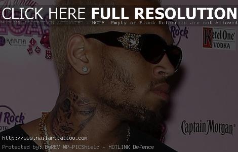 chris brown black eye tattoo