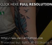 colorful bird feather tattoos