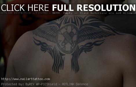 cool upper back tattoos for guys