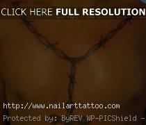 cross with barb wire tattoos