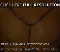 cross with barb wire tattoos
