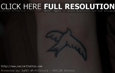 dove bird tattoos on wrist
