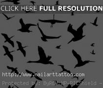 flying bird outline tattoo