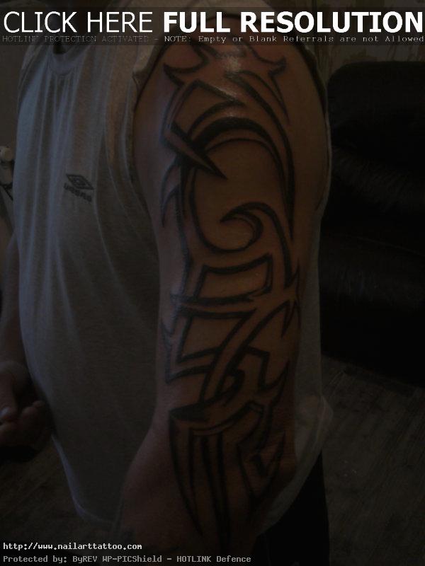 Tribal Full Arm Tattoo