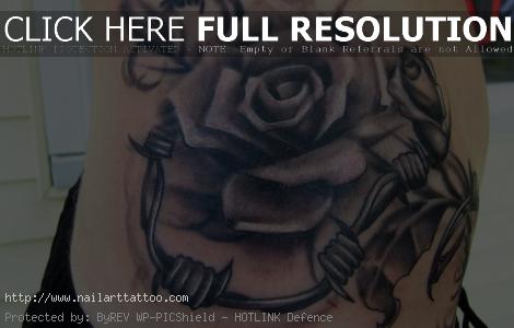 roses with barb wire tattoos