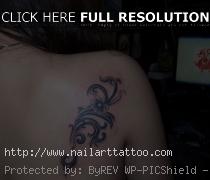 simple back tattoo designs for men