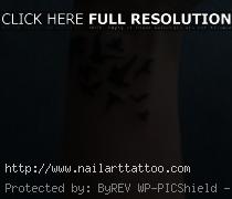 small bird wrist tattoos