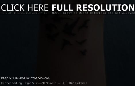 small bird wrist tattoos