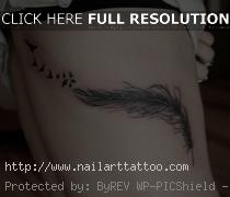 small black feather tattoo
