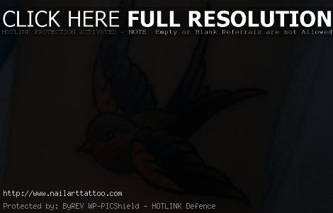 swallow bird flying tattoo
