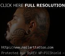 tribal aztec sun tattoos