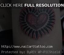 black bleeding heart tattoo