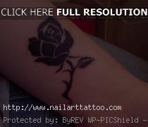 black rose tattoos on hand