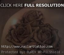 black rose tattoos on shoulder