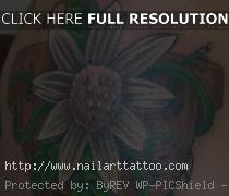 bleeding heart flower tattoo hip