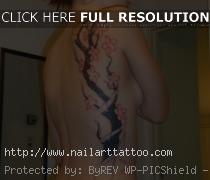 blossom tree tattoo on side