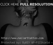 blue bird tattoo on neck