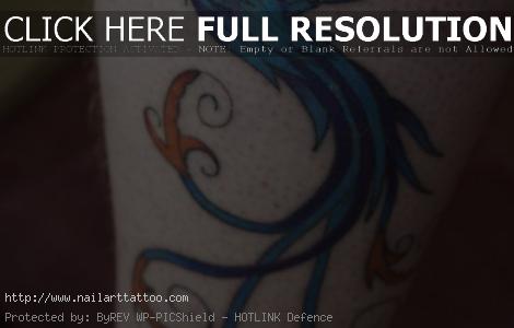 blue bird tattoo on wrist