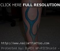 blue flame tattoo on arms