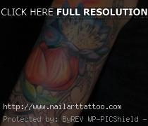 blue flower tattoo sleeve