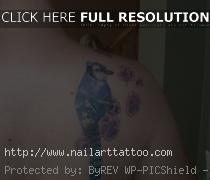 blue jay tattoo on shoulder