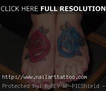 blue rose tattoo on foot