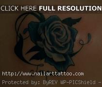 blue rose tattoo on shoulder