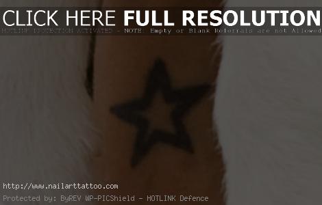 blue star tattoo on wrist