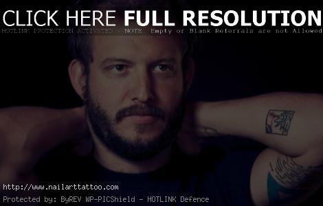bon iver tattoo arm