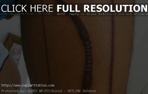 bow and arrow tattoo