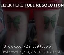 bow tattoo designs on thigh