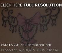 bow tattoos for girls on back