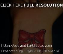 bow tattoos for girls on wrist