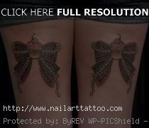 bow tie tattoos on back of legs
