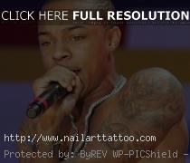 bow wow tattoos on chest
