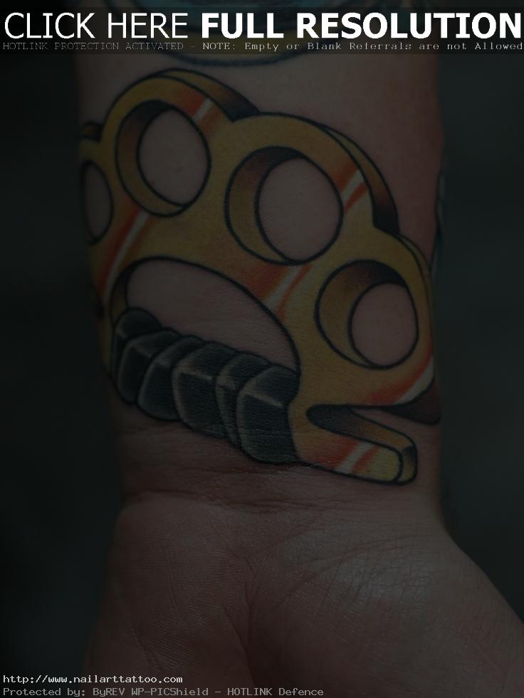 brass knuckle tattoos