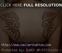 brown ink tattoo on brown skin
